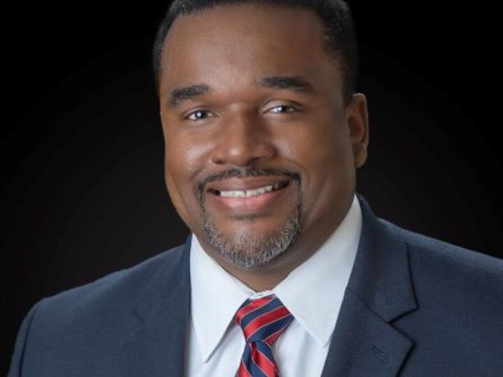 George E Harrison, MD, Chairman